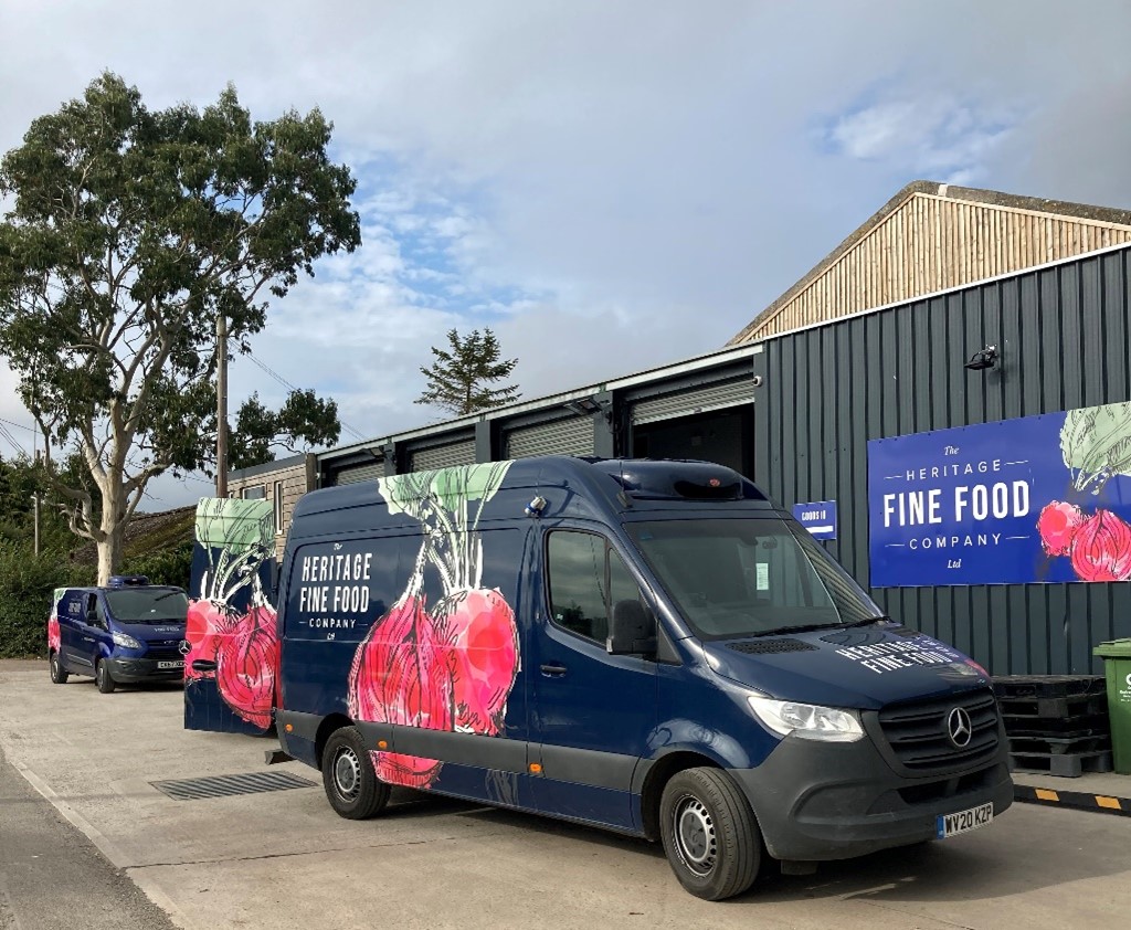 heritage vans parked outside the warehouse