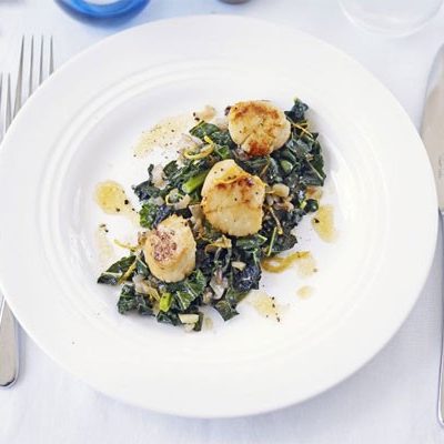 Seared scallops with flavoured greens Seared scallops with flavoured greens
