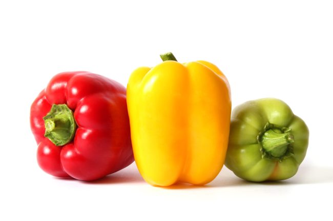 Bulgarian pepper in different colors isolated on white.