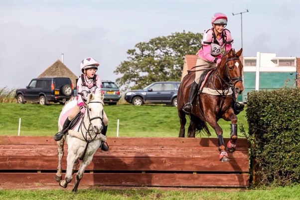 Lucinda Fredericks riding on a horse