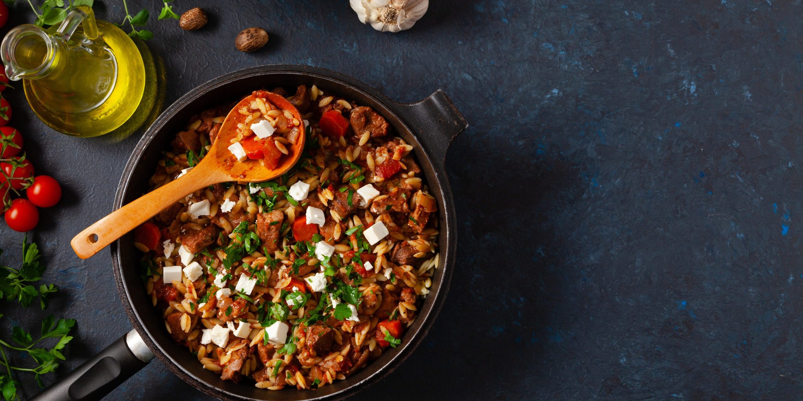 Traditional Greek cuisine. Lamb stew with feta cheese and vegeta