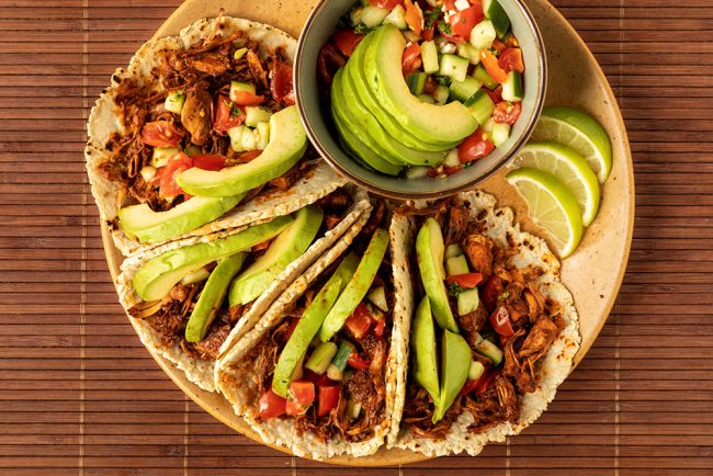 Shredded jackfruit tacos with avocado and pico de gallo salsa. M