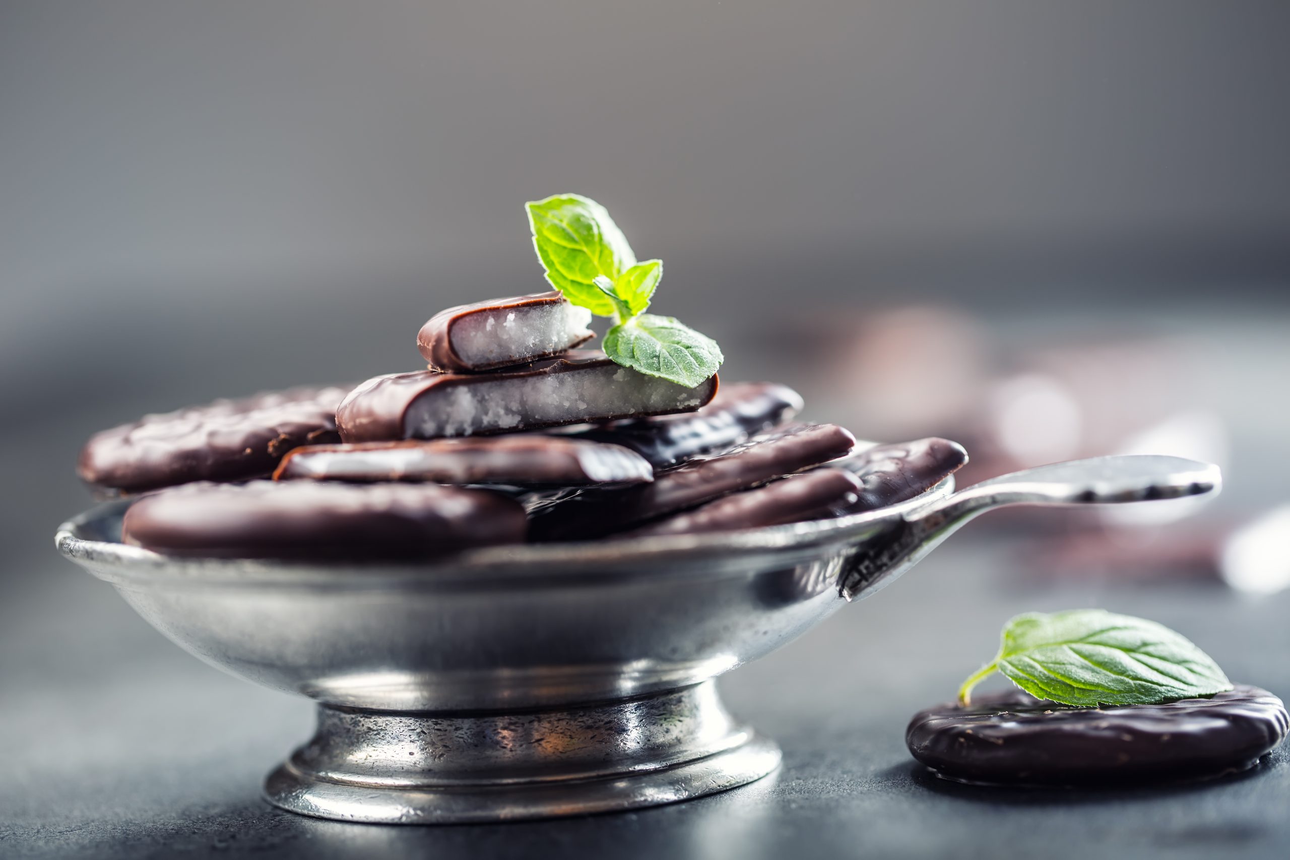 Cocolate peppermint cookies.Mint. Peppermint. Menthol. Black chocolate with peppermint cream. Black chocolate with mint stuffing. Menthol chocolate with mint leaves. Toned images