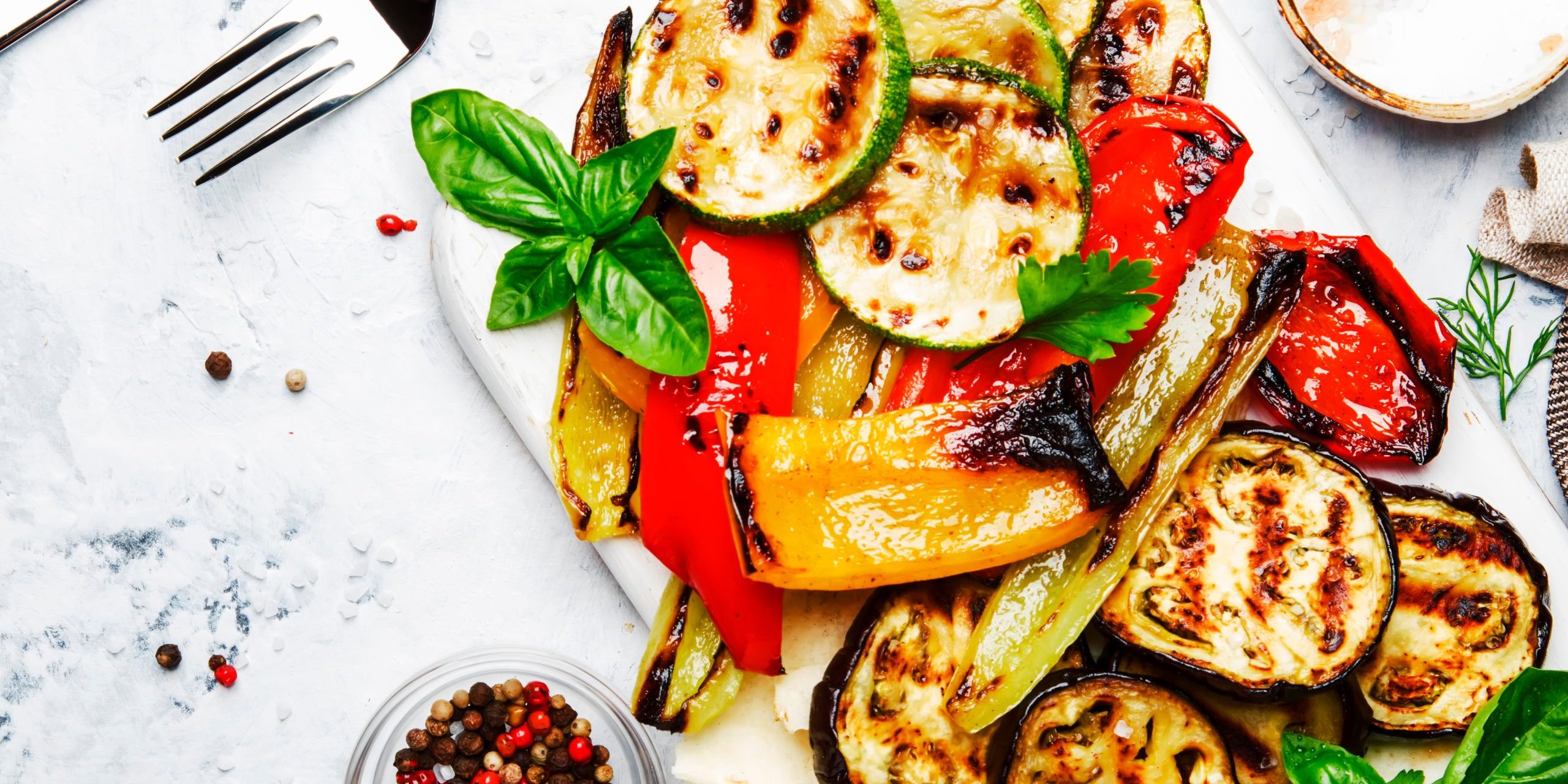 Grilled colorful vegetables, aubergines, zucchini, pepper with s