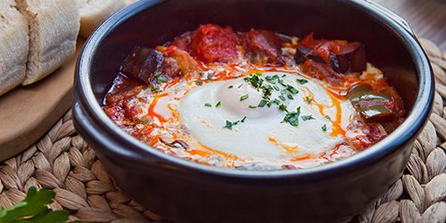 Pisto con huevo –  Spanish cuisine roasted vegetables ratatouill