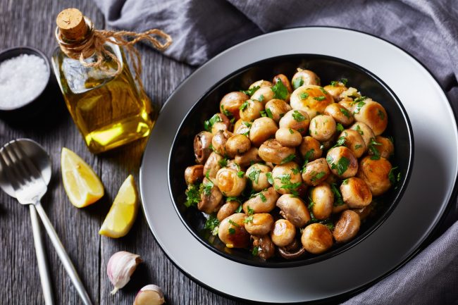 Low-calorie garlic mushrooms al ajillo on a plate