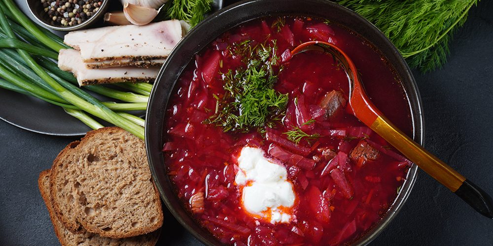 Traditional Ukrainian Russian borscht . Bowl of red beet root so