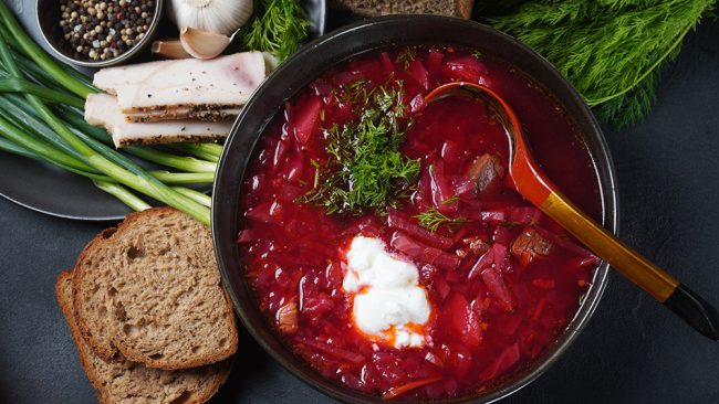 Traditional Ukrainian Russian borscht . Bowl of red beet root so