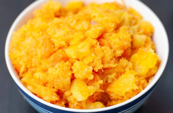 A bowl of mashed carrot and swede