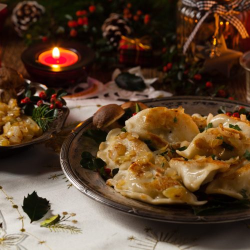 Traditional dumplings with cabbage and mushrooms. Christmas decoration. Top view. Front view.
