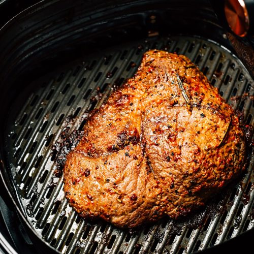 Grilled flank beef steak with rosemary, prepared in airfryer