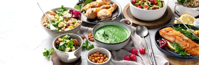 Healthy food assortment on light background.
