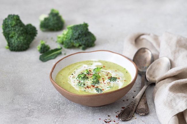 Spring  broccoli green cream soup .Healthy food concept