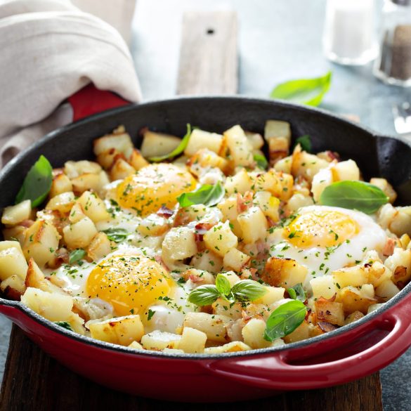 Potato hash with ham, herbs and eggs for breakfast