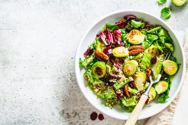 Fried brussels sprouts salad with quinoa, cranberries and nuts i