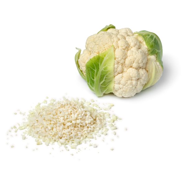 Heap of fresh cut cauliflower rice and whole cauliflower isolated on white background