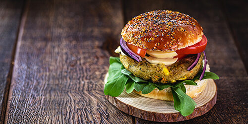 Vegan hamburger, Sandwich made without meat, with glass of green