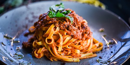 delicious italian spaghetti bolognese with minced beef sauce, to