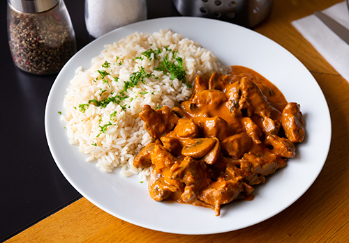 Beef stroganoff with rice. Czech cuisine