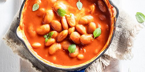 Enjoy your baked beans with garlic and fresh tomatoes