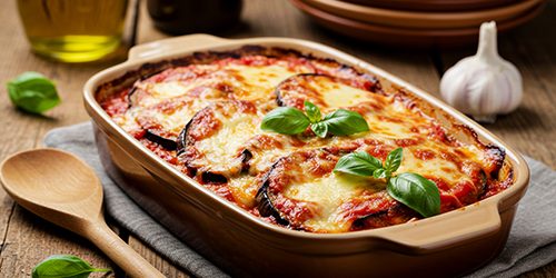 Classic Italian eggplant parmesan in baking dish