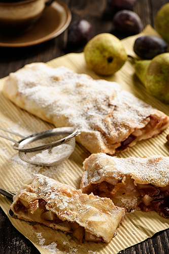 Strudel with pear, plums and cinnamon.