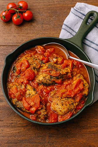 Chicken with mushrooms and tomato